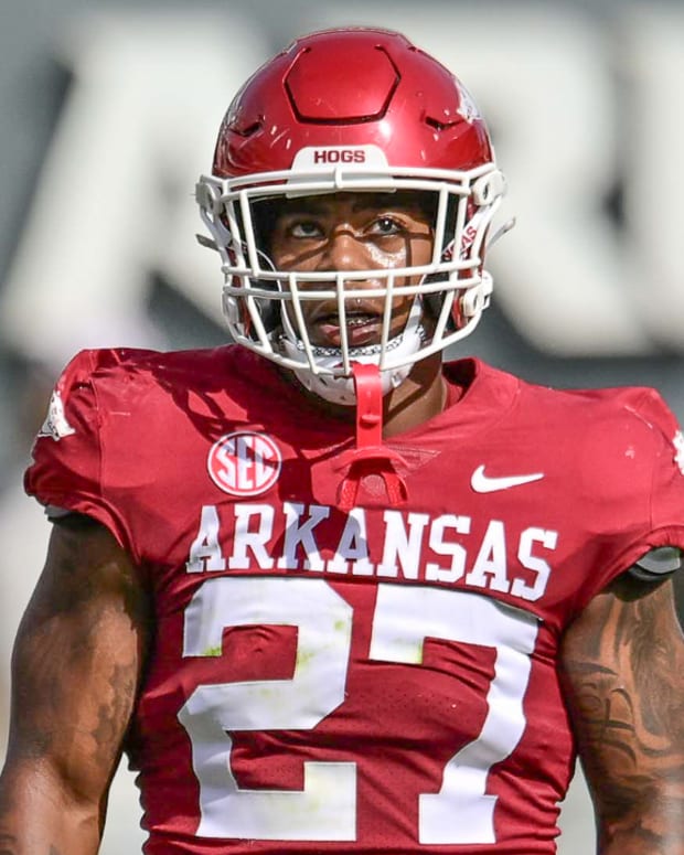 Razorbacks' Pooh Paul looking at Mississippi State quarterback Mike Wright on Saturday afternoon
